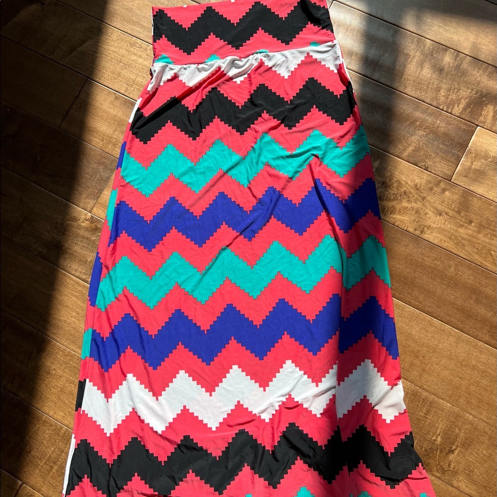 Never worn long multi color super stretchy skirt or top! XL